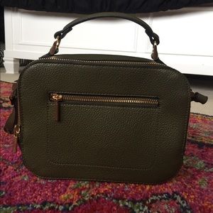 Barely used camera bag style purse. Army Green.
